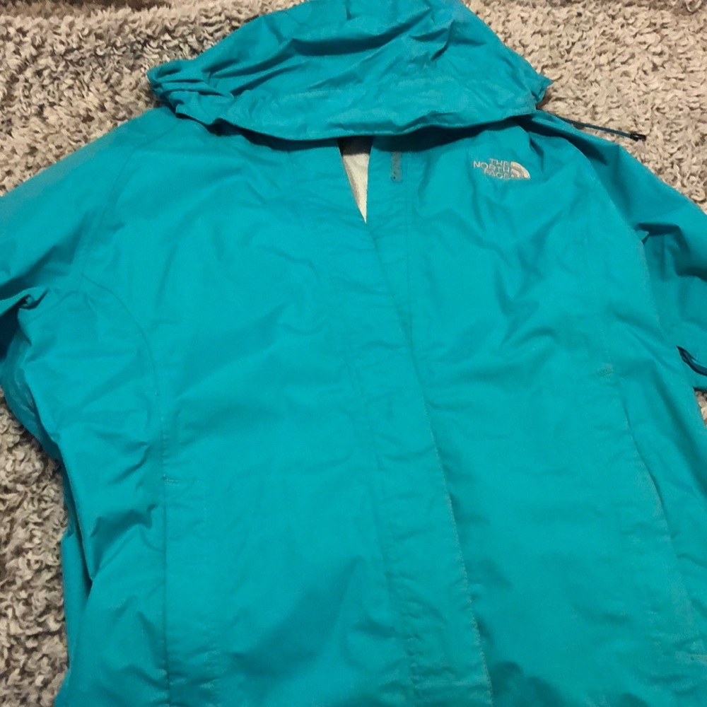 North face turquoise rain jacket